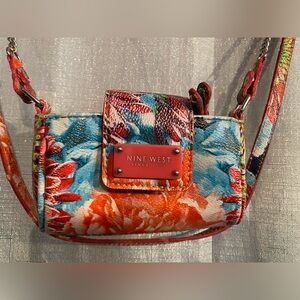 Festival wear  Nine West floral small purse with a shoulder strap  small items